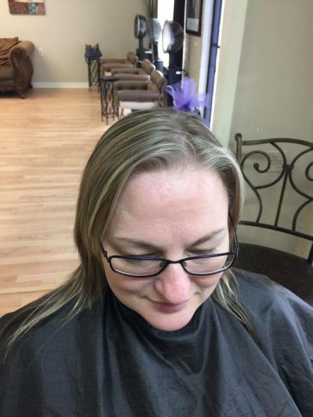 She is ready for her transformation at the Reflections Hair Salon! Find the inner you with our beauty and hair specialists.
